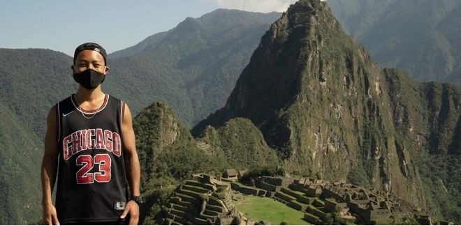 Asian traveler waits seven months in Peru to visit the Inca citadel.