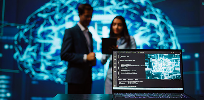 Laptop displays lines of code and a digital brain on screen in allusion to Lima Tech Week 2024.